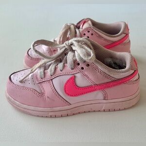 Nike girl’s Dunk Low Basketball Sneaker.  Size 11T.
